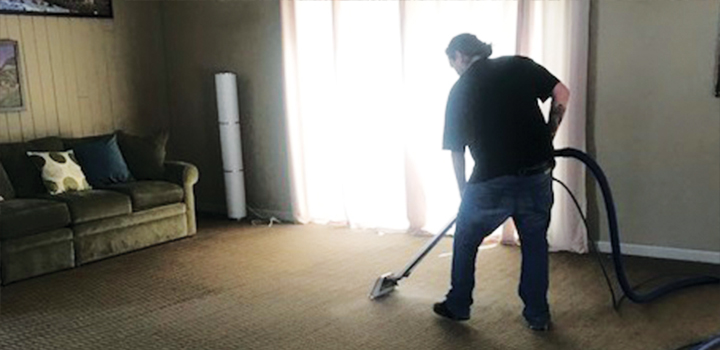 Man Performing a Carpet Cleaning Job in Aurora, CO, Denver, Golden, CO, Highland Ranch, Lakewood, CO, and Littleton