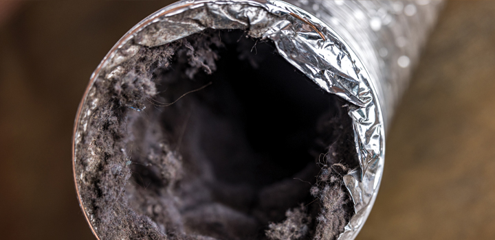 A Dryer Vent in Need of Cleaning Services in Aurora, Co