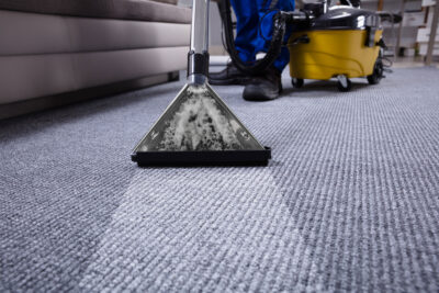 professional providing Commercial Carpet Cleaning and Carpet Repair in Aurora, CO